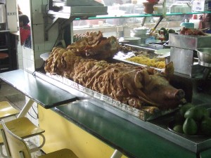 Could this full-size deep fried pig hanging out practically in the walkway of the market be Hornado?