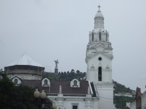 Statue of the Virgin of Quito above the church on the Plaza Grande