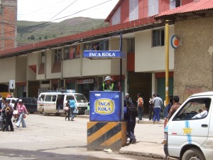 A friendly Inca Kola cop directing traffic